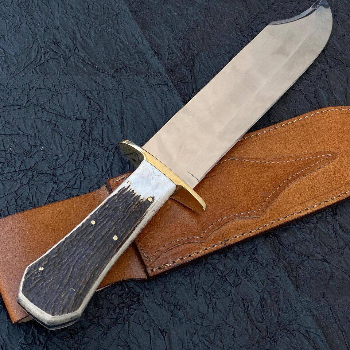 Custom-finished stag handle Bowie knife crafted by hand.