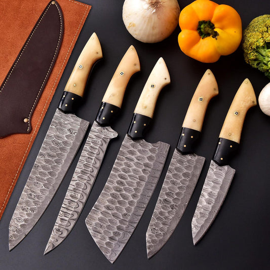Natural white handle Damascus kitchen knife set arranged for home and chef use
