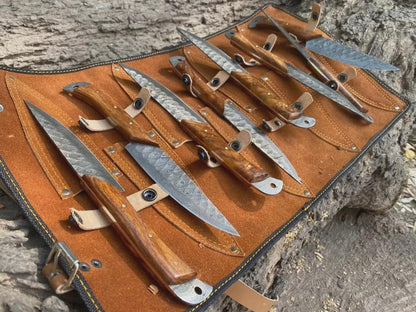 Forged Damascus steel steak knives with natural material handles
