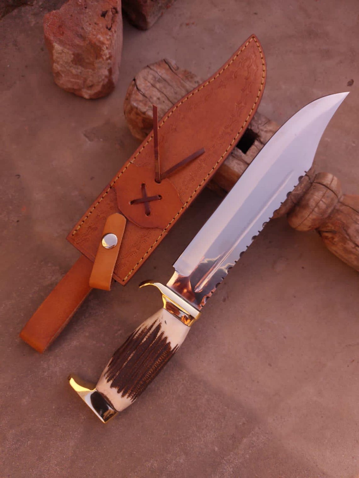 Close-up photo showing the natural grooves and coloring of the stag handle grip.