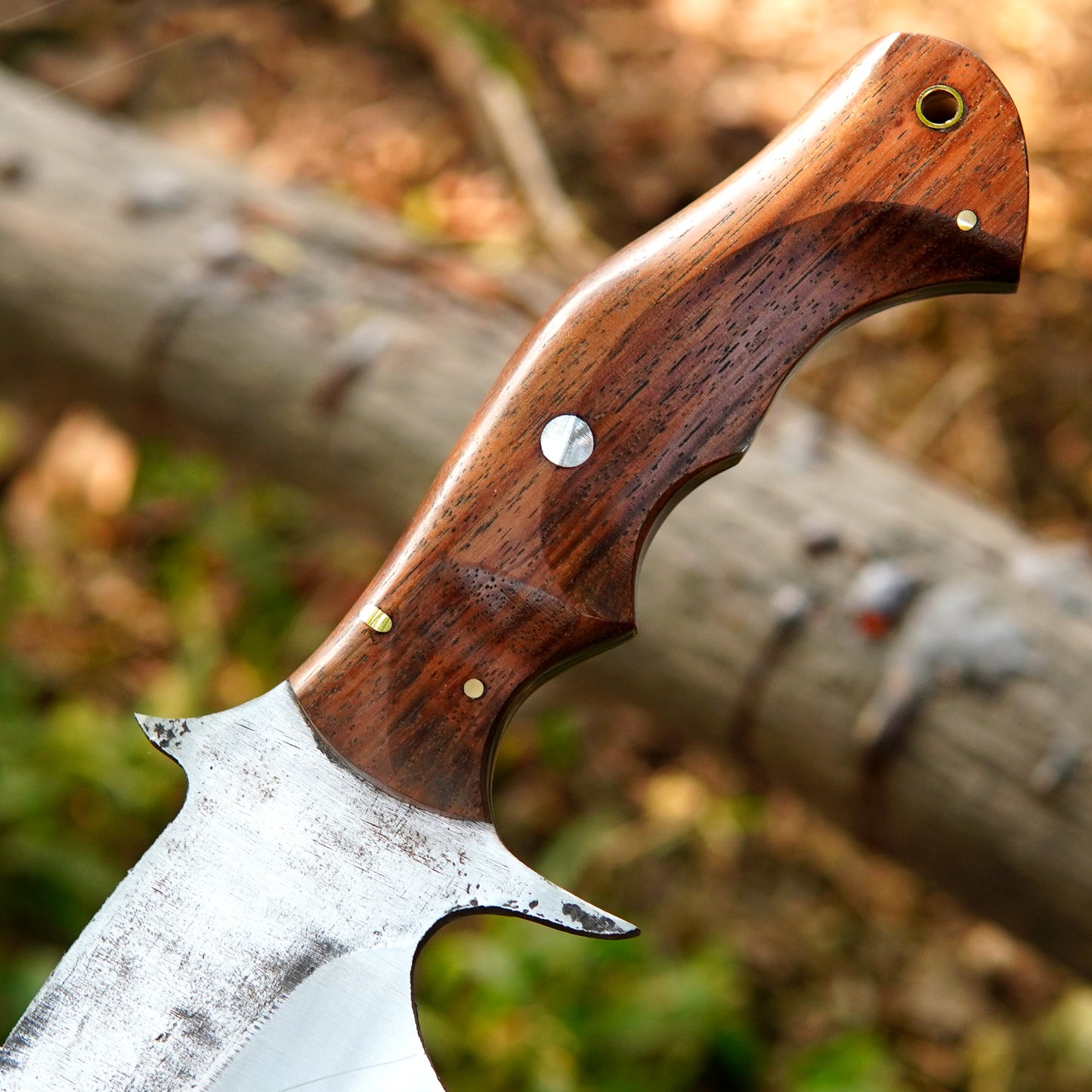 Artisan made bowie knife paired with a premium leather sheath for safe storage and carry.