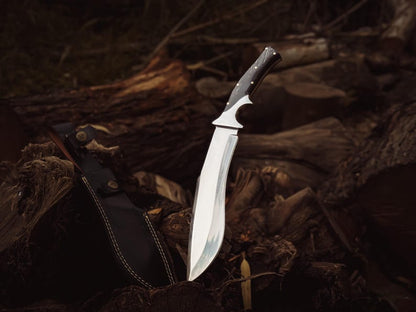 Close-up of the buffalo horn handle with brass pins and ergonomic finger groove.