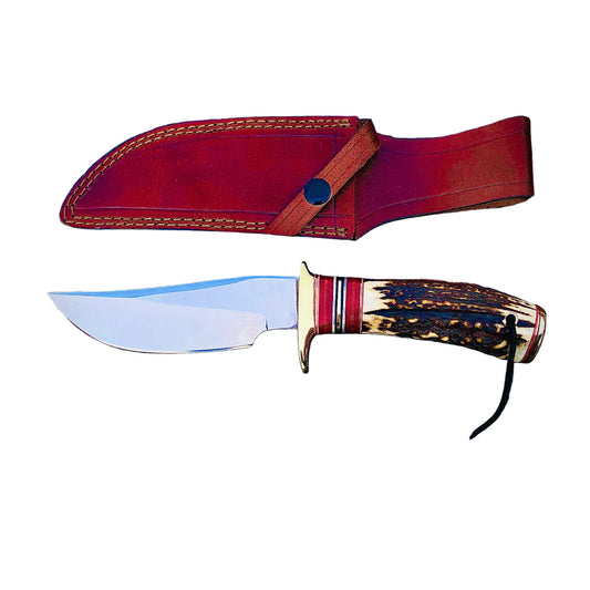 Handmade hunting knife with carbon steel blade, stag antler handle accented with red micarta spacers, and a stitched leather sheath. Designed for durability and outdoor performance, this knife blends traditional craftsmanship with modern style, making it perfect for hunters, campers, and collectors.