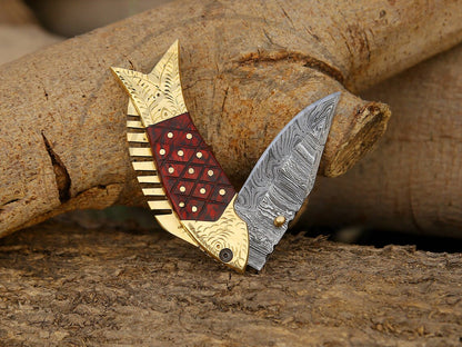 Detailed diagram showing Damascus steel blade, brass bolsters, and wood handle parts.