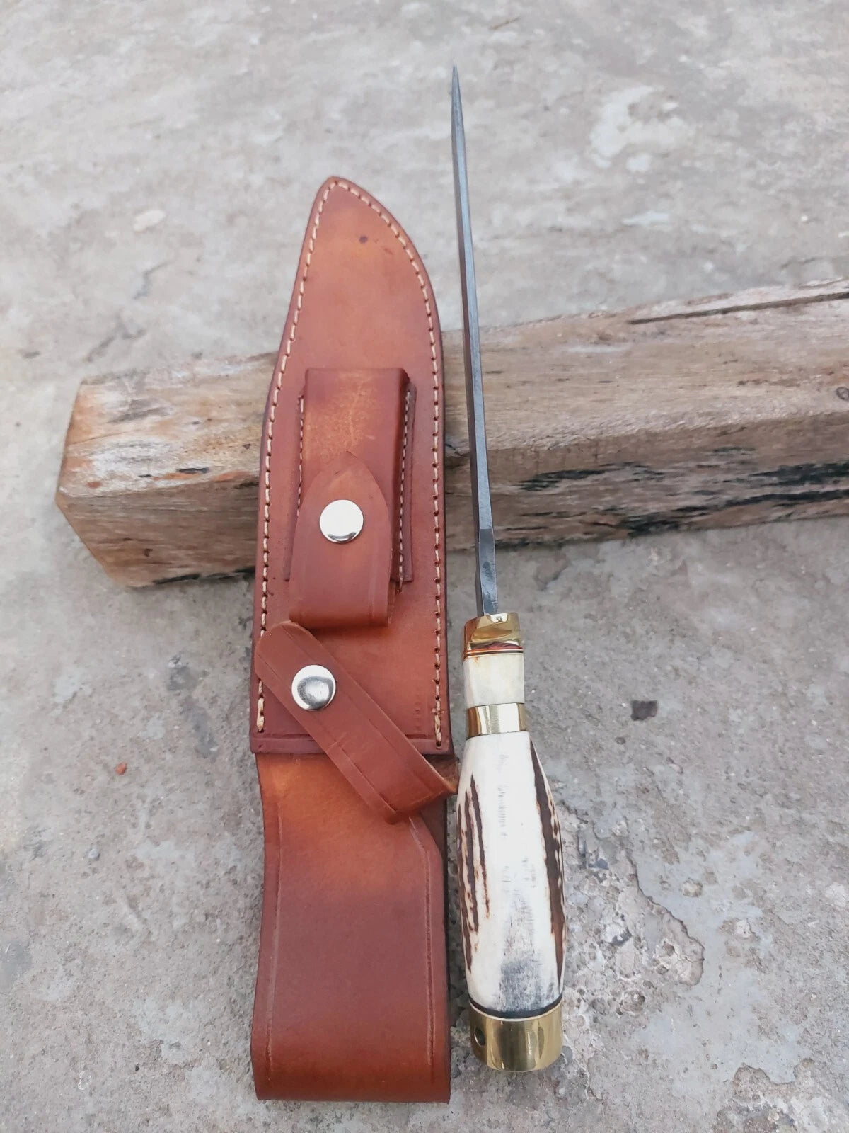Handmade Damascus hunting knife with traditional stag handle and premium sheath. Each knife has its own unique Damascus patterns, making it a one-of-a-kind piece for outdoor adventurers and collectors.