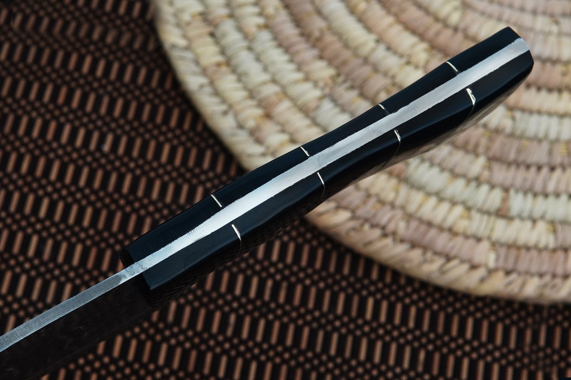 This full tang Serbian chopper is forged from Damascus steel and finished with a black buffalo horn handle. Handmade for precision and strength, it works equally well for kitchen tasks and outdoor cooking. Includes free engraving.