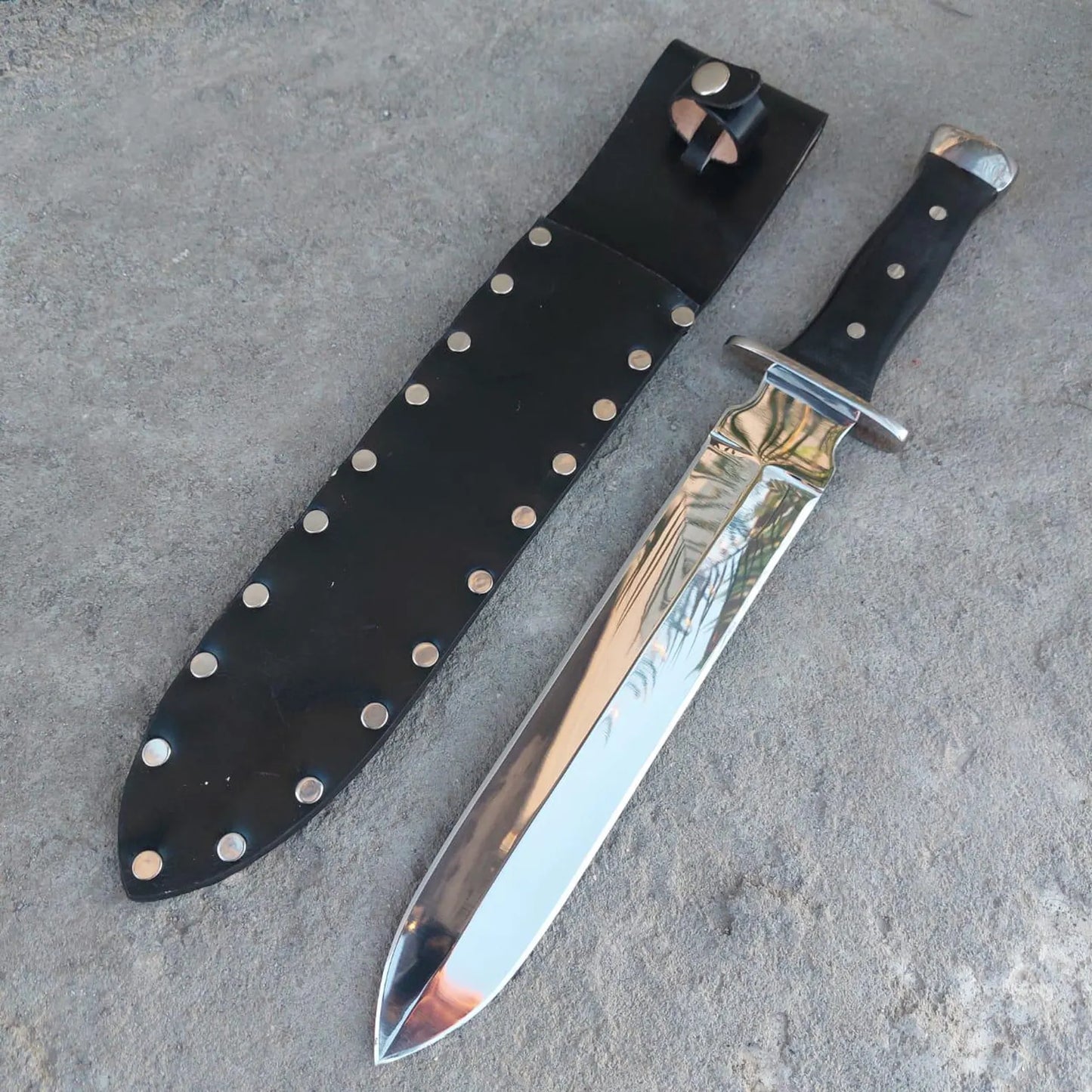 Short sword displayed as part of a handmade collection.