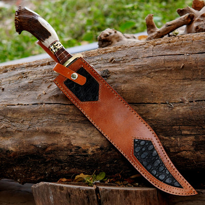 Detailed handle closeup of handmade bowie knife showing natural material texture and polished guard. The image emphasizes grip comfort, handmade finishing, and premium appearance which appeals to outdoor enthusiasts and collectors looking for strong and visually unique handcrafted knives.