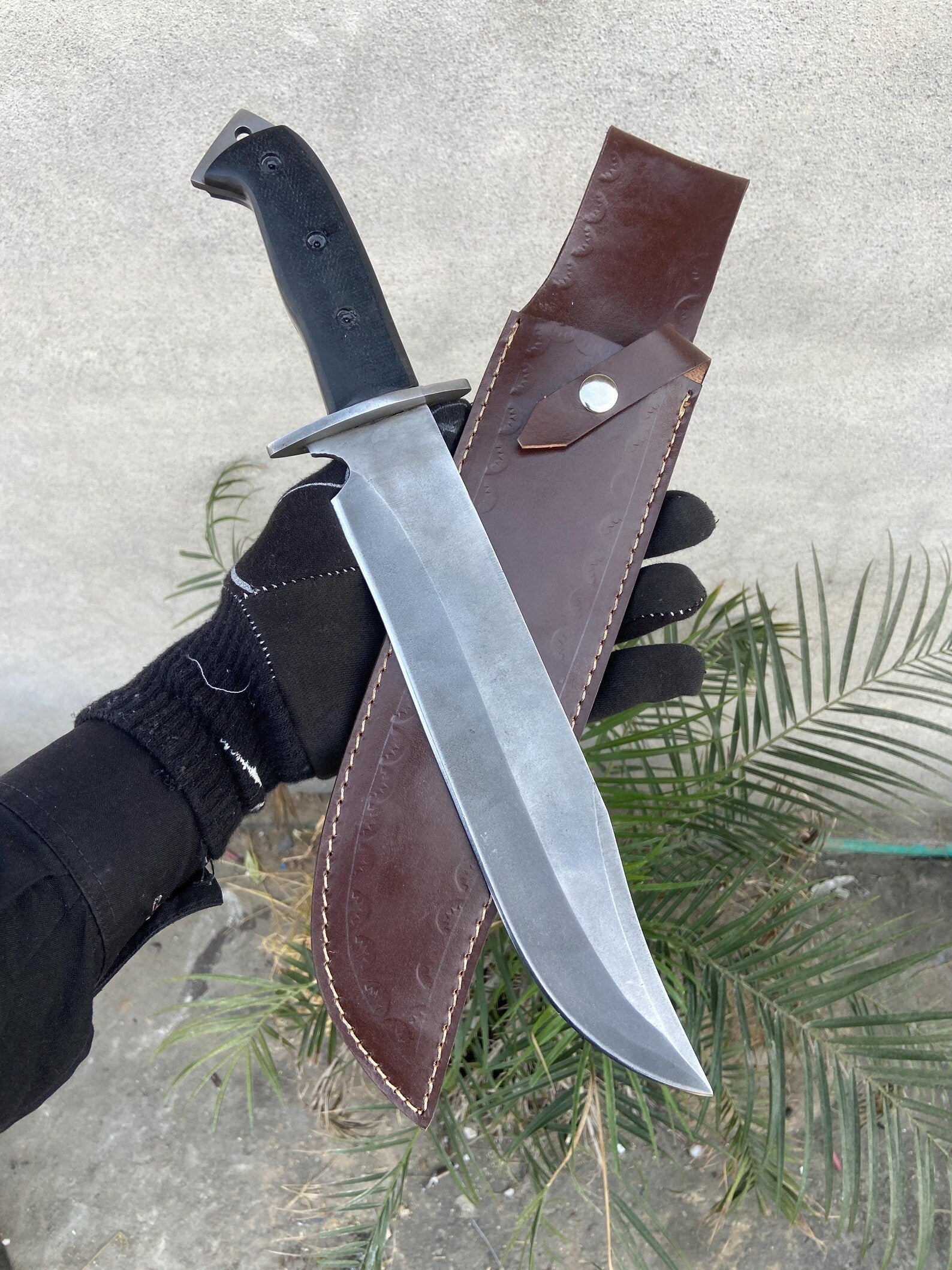 Handmade bowie knife with black micarta handle and 5160 spring steel blade