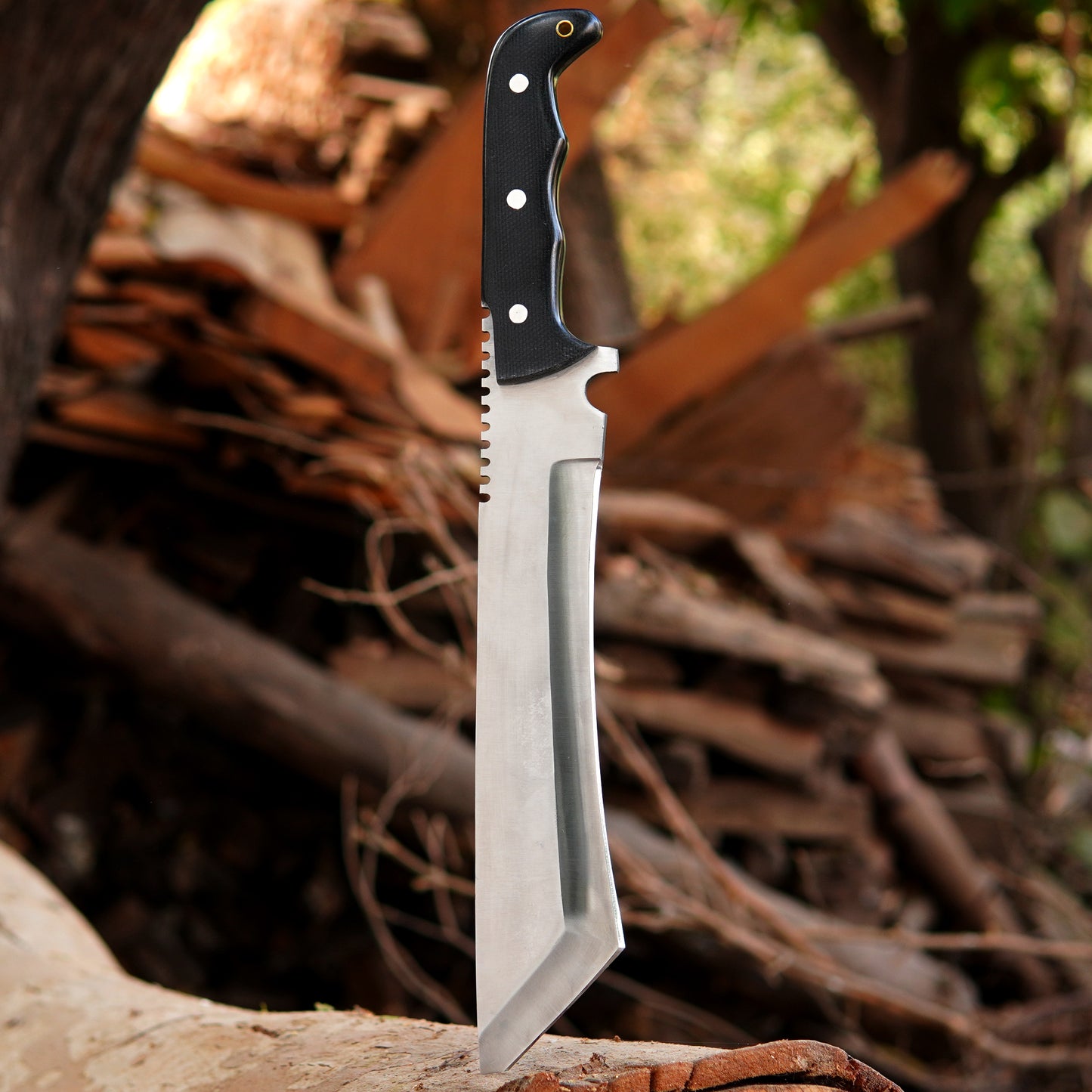 Side angle image showing bowie knife with leather sheath highlighting sheath structure button closure and protective design created for safe storage transport and outdoor convenience.