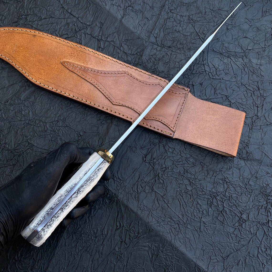 Polished carbon steel Bowie blade with sharp edge and clean finish