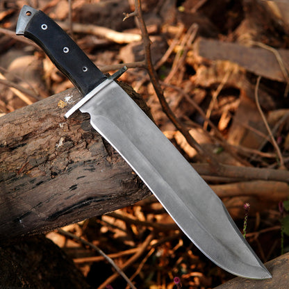 Custom crafted bowie knife featuring a clean steel blade and textured synthetic handle for secure grip.