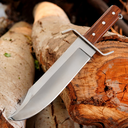 Full tang hunting knife with hardwood handle and polished steel guard for outdoor durability.