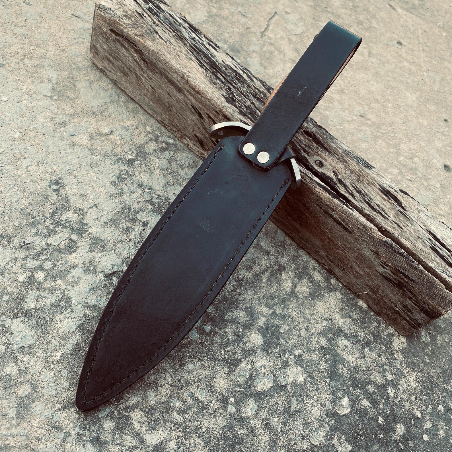 Custom engraved handmade dagger knife ready for gift presentation.
