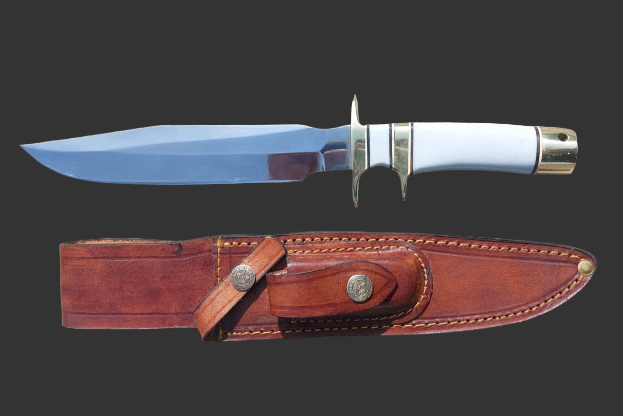 Custom handmade hunting knife with a polished steel blade, ergonomic white handle, and brass guard. Supplied with a quality stitched leather sheath, making it ideal for hunting, camping, or collecting.