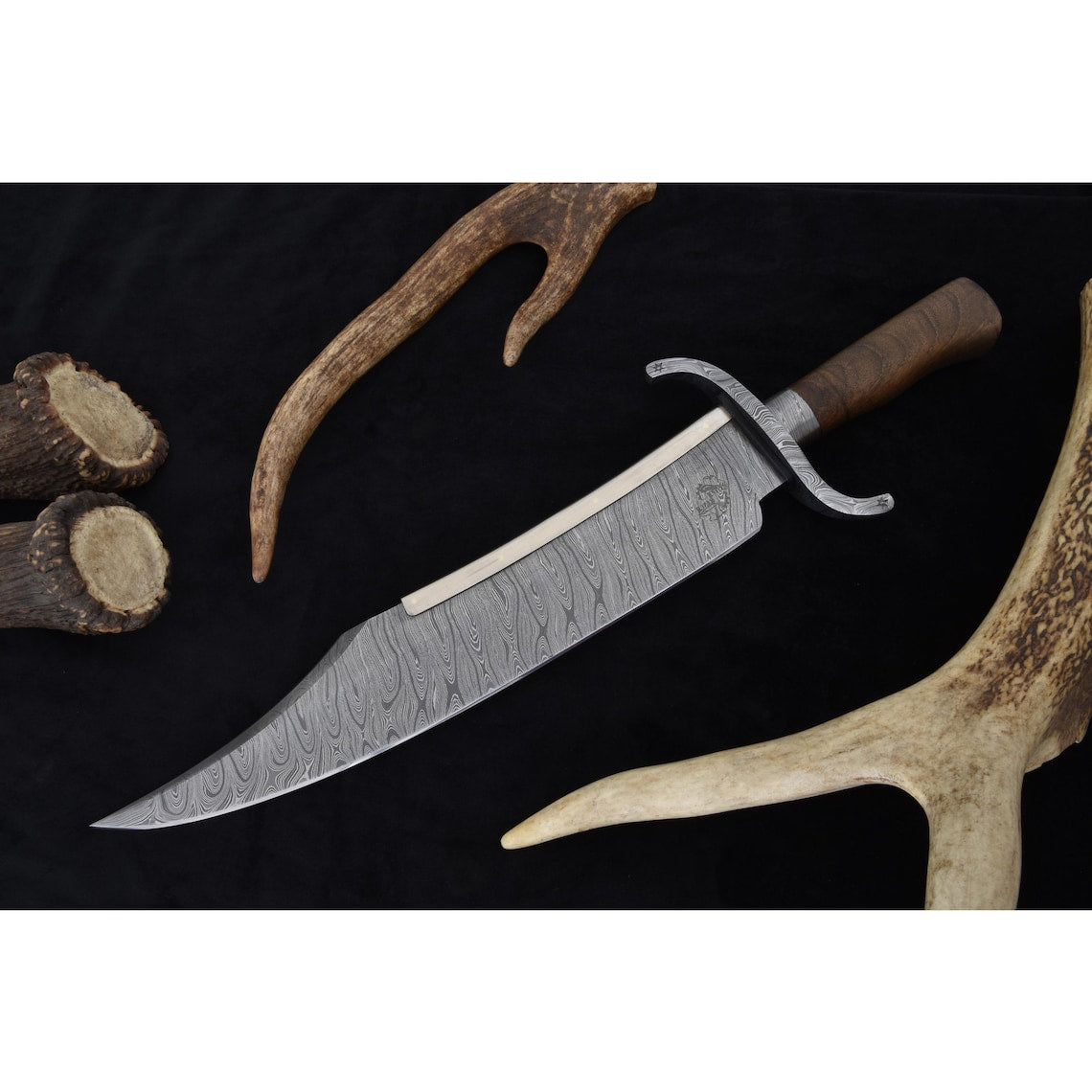 Large 19.75-inch handmade Bowie knife forged from 5160/4340 Damascus steel with elegant walnut handle. Ideal for survival, hunting, and collectors seeking a traditional Texas Bowie style.