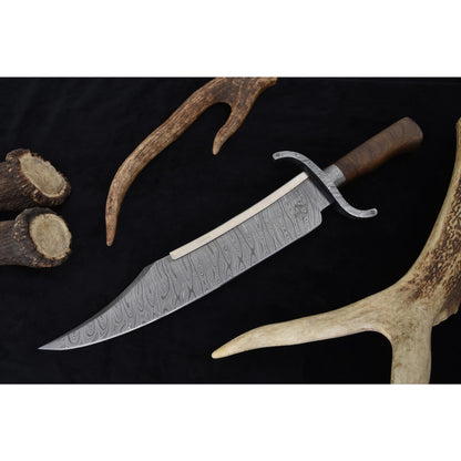 Large 19.75-inch handmade Bowie knife forged from 5160/4340 Damascus steel with elegant walnut handle. Ideal for survival, hunting, and collectors seeking a traditional Texas Bowie style.
