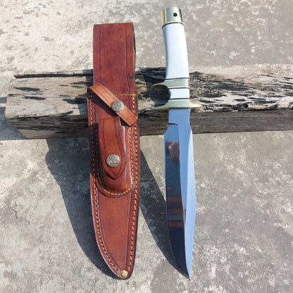 Premium handmade hunting knife with steel blade, white handle, and brass accents. Includes a leather sheath for safe storage, suitable for hunters, campers, and collectors.