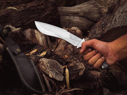 Full view of the hand-stitched leather sheath with brass hardware and reinforced stitching.