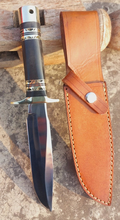 Handmade micarta handle hunting knife with mirror-polished blade and brass guard. This knife is perfect for hunters and collectors seeking a balance of durability, sharpness, and elegant design.