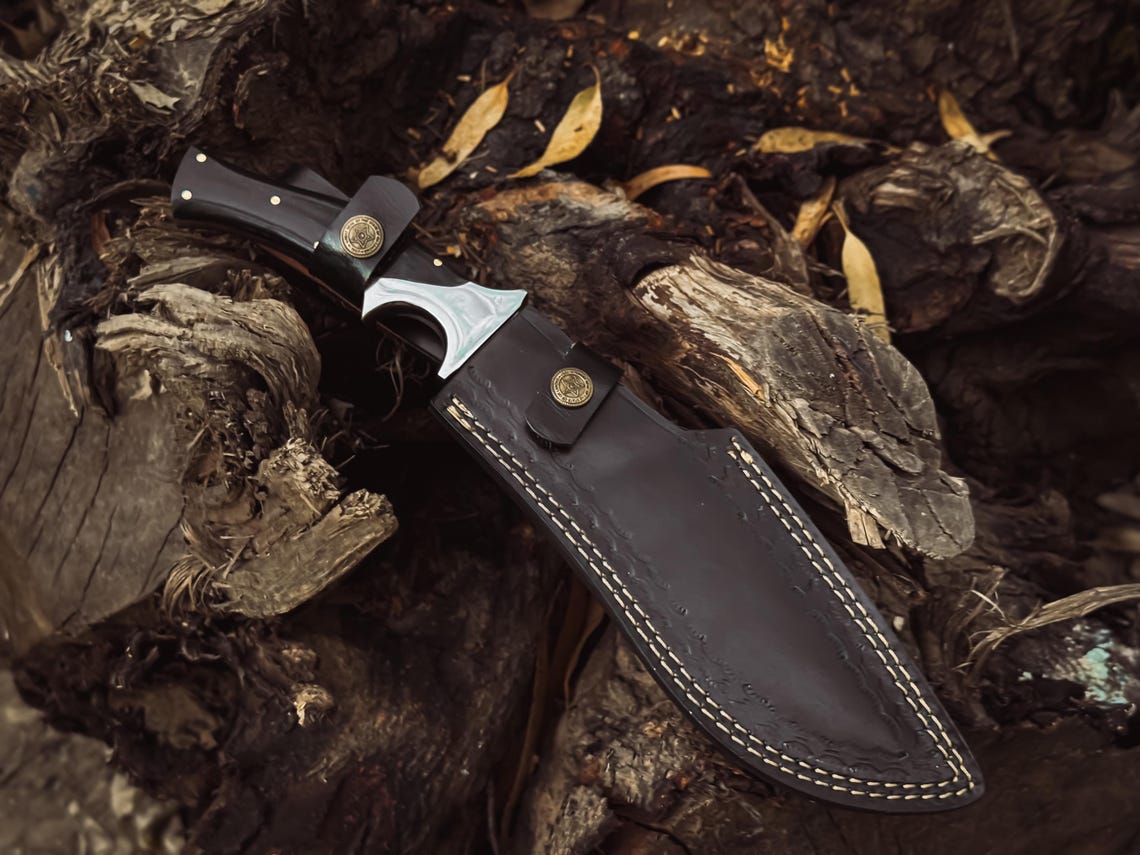 Macro detail of the blade edge and finish showing hand-polished surface.