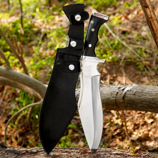 Handcrafted full tang outdoor knife displayed in a natural environment showing its balanced blade shape, premium handle finish, and solid construction designed for long-term outdoor reliability and everyday utility use.