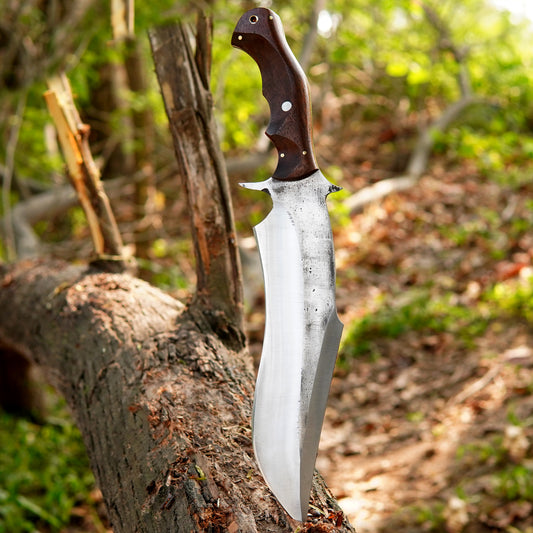 Custom crafted bowie knife featuring a satin finished steel blade and ergonomic wooden handle.