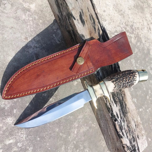 Custom handmade high carbon steel hunting knife with subhilt design, polished blade, and brass guard. The strong and sharp blade ensures reliability during hunting and outdoor activities. Delivered with a hand-stitched leather sheath for safe carrying.