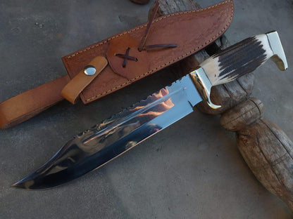 Full-grain hand-stitched leather sheath with snap strap and belt loop shown in close view.