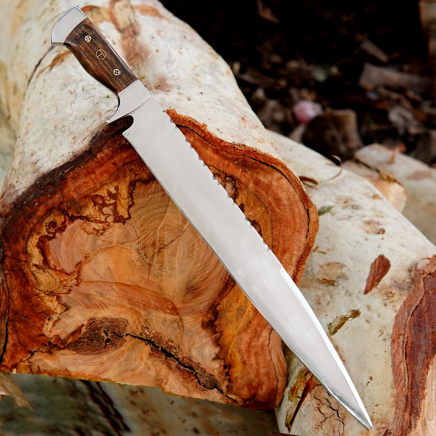 Premium outdoor knife arranged for lifestyle shot highlighting the elegant wood handle grain polished metal fittings and classic leather sheath. Built for campers hunters and adventurers who want a reliable fixed blade tool this handmade knife also works great as a meaningful gift for men who appreciate quality outdoor equipment